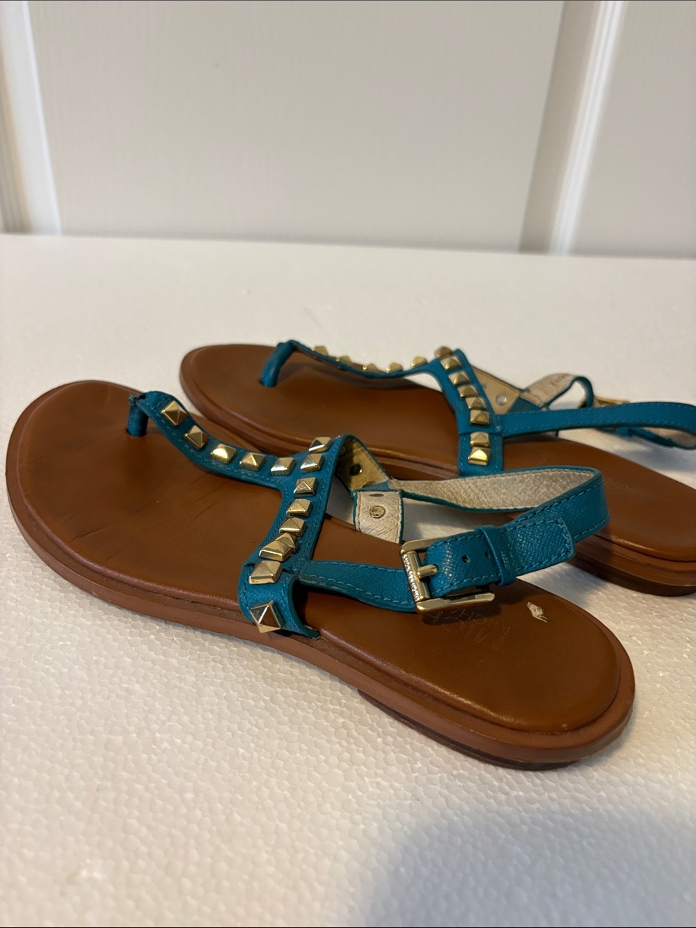 MICHAEL Michael Kors Teal Leather Studded T-Strap Sandals with Gold Accents